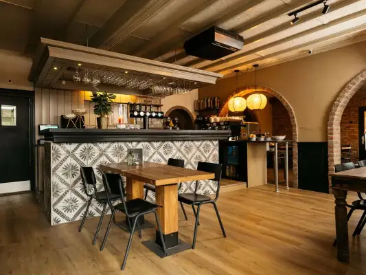 De gezellige bar bij Carré Hotel Zuid-Limburg De gezellige bar bij Carré Hotel Zuid-Limburg